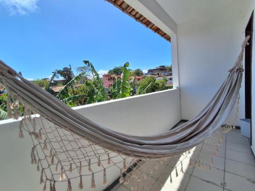 Балкон/тераса, Odoyá Casa Hostel - simples, tranquilo e bem localizado (Odoya Casa Hostel - simples, tranquilo e bem localizado) in Порто Сегуро