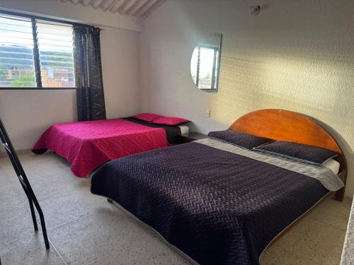 2 queen beds, 1 twin bed