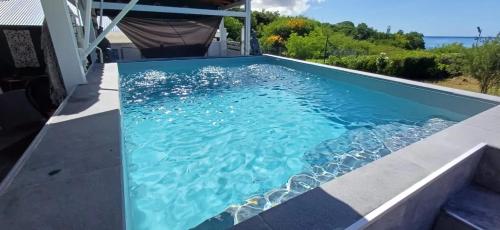 Vista/Panorama, Bungalow accueillant à Bouillante avec piscine privée (Bungalow accueillant a Bouillante avec piscine privee) in Bouillante