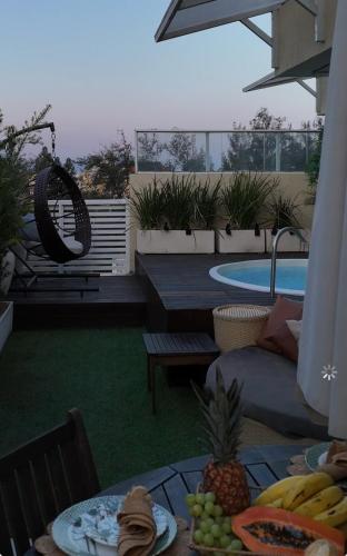 Cobertura com Piscina Aquecida ou Apartamento com Varanda near Prainha Beach