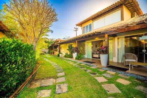Na Quadra da praia! Casa 5 suítes em condominio. BZ09 – khách sạn tại Bãi Biển Maghuinhos