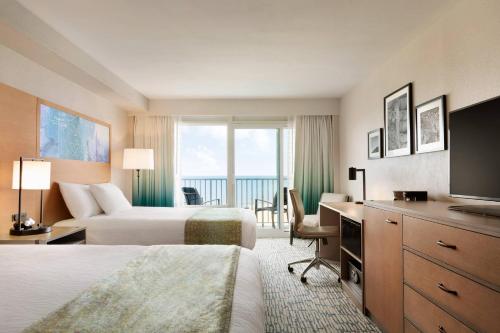 Surfbreak Virginia Beach Oceanfront, an Ascend Collection Hotel Room Type - Queen Studio with Two Queen Beds - Accessible/Non Smoking Ground Floor