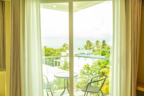 View, Paradise Found near Dhiffushi Island (South Ari Atoll)
