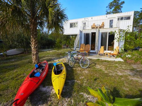 Upcycled Shipping Containers Transformed into a Glamping Home for a Unique Florida Vacation