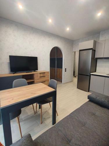Közös társalgó / TV, New Suit Apartment in Bucha
