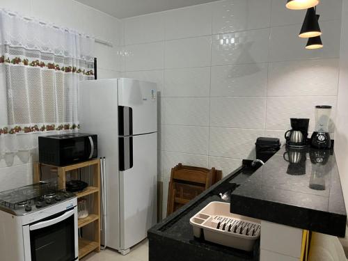 Kitchen, Beach house in Cabo Frio in Aquarius