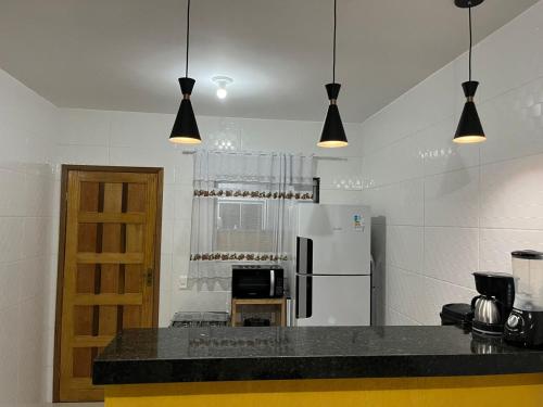 Kitchen, Beach house in Cabo Frio in Aquarius