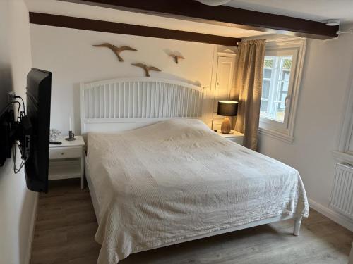 Ferienwohnung Südwind (Ferienwohnung Sudwind) in 拉本基爾興-福呂克