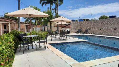 Casa 85 m2 no FORTE 2 quartos campinho piscinas 2 vagas no estacionamento portaria ar condicionado para 8 pessoas