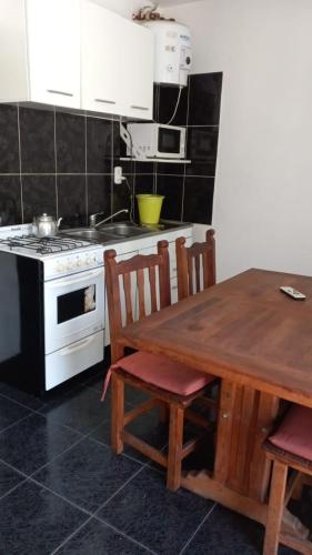 Los Gringuitos - Trapiche in เอล ตราปิเช