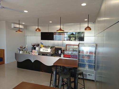 Restaurant, Ketje Luxury Capsule Bandara Raden Inten II in Metro