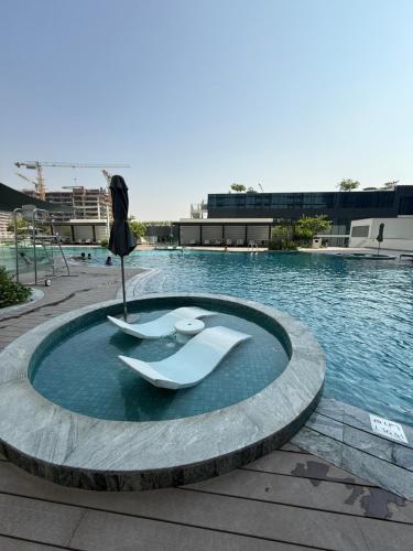 Swimming pool, Capsule Super Heroes - Playstation 5 Burj Khalifa View - Near Downtown Dubai in Nad Al Sheba