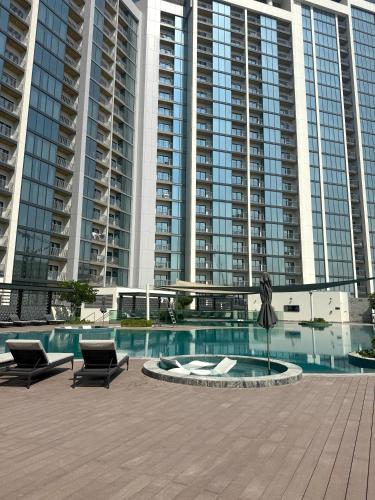 Swimming pool, Capsule Super Heroes - Playstation 5 Burj Khalifa View - Near Downtown Dubai in Nad Al Sheba