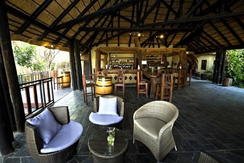 Bar/Lounge, Gondwana Namushasha River Lodge in Kongola