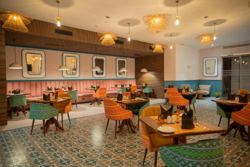 Restaurant, Zibe Luxe Kakinada by GRT hotels in Kakinada