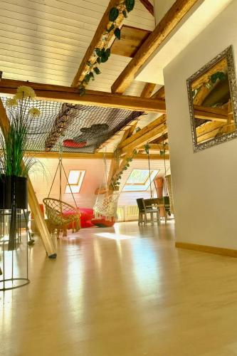 Aussergewöhnliche Loft Wohnung mit Hängenetzen und Schaukeln (Aussergewohnliche Loft Wohnung mit Hangenetzen und Schaukeln) in Frauenfeld