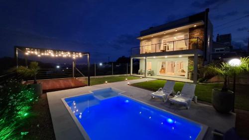 Kert, Casa 2 suítes, ofurô, piscina no Vale dos Vinhedos (Casa 2 suites, ofuro, piscina no Vale dos Vinhedos) in Monte Belo Do Sul