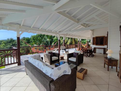 Изглед, Villa de charme avec piscine et vue mer à Deshaies (Villa de charme avec piscine et vue mer a Deshaies) in Дешайес