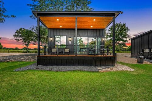. Peaceful Farmhouse-Style Tiny Home Resort with Goats & Pool in Hempstead, Texas