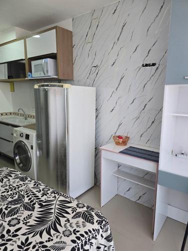 Full studio, TV, washing machine, microwave near Praça Joaquim Lopes Guimarães