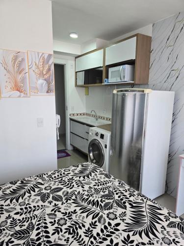 Full studio, TV, washing machine, microwave near Praça Joaquim Lopes Guimarães