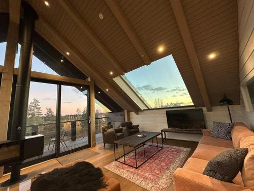 Naava Chalet Penthouse - Kattohuoneisto järvinäköalalla (Naava Chalet Penthouse - Kattohuoneisto jarvinakoalalla) in 艾赫泰里