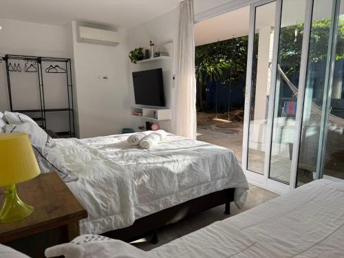 Charmosa hospedagem no Jardim Secreto SP in ริโอเปเกโน