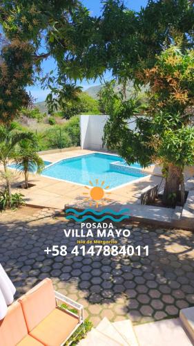 Swimming pool, Habitacion Triple Equipada, Posada Villa Mayo a 5 minutos de Playa Parguito in El Hato