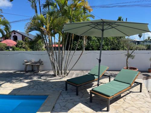 Изглед, Chambre et Bungalow confort vue piscine in Baie-Mahault