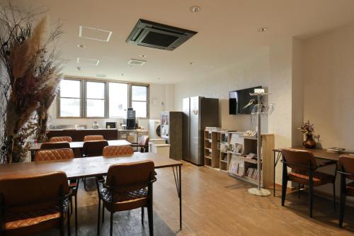Shared lounge/TV area, Regions Hostel in Yuzawa-shi