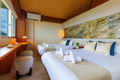 10 seconds to the sea, jacuzzi & BBQ available, ocean view from every room on the beach Terrace