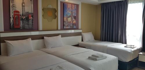 BlueTel Re'sidence Bangkok IMPACT Room Type - Deluxe Triple Room