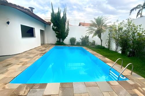 Casa com piscina • salão de jogos • 4min do Autódromo (Casa com piscina • salao de jogos • 4min do Autodromo) in ソコロ
