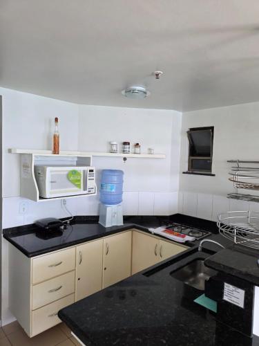 Kitchen, LOFT - Beira Mar, com piscina, Wi-Fi e garagem in Arraial do Cabo
