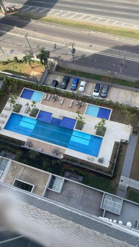 สระว่ายน้ำ, Quarto Casal suite privada em Apartamento Seguro in เซาโดมิงโกส