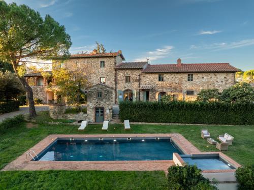Зовнішній вигляд готелю, Relais Badia a Passignano in Таварнелє у Валь ді Пеза