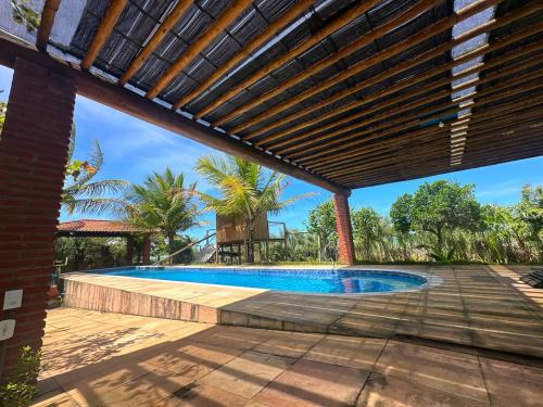 Úszómedence, Belíssima Casa Pé na Areia, relaxe frente ao mar! (Belissima Casa Pe na Areia, relaxe frente ao mar!) in Mutari