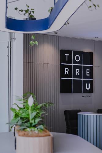 Torre U kooliving - Photo 1