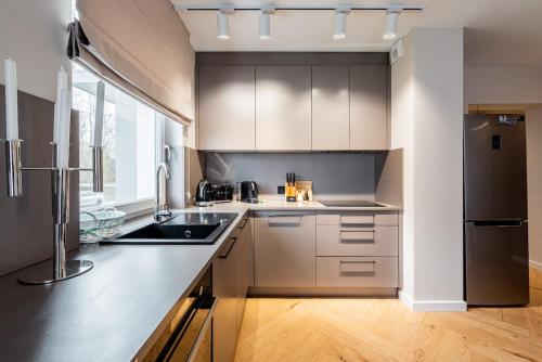 Apartment nad morzem Kołobrzeg (Apartment nad morzem Kolobrzeg) in โอโกรดี