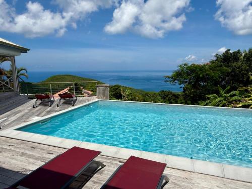 Lodge Orchidee de "La Villa La Palmira" - Vue Mer des Caraibes - Jacuzzi Prive - Acces Piscine 5x9 - in Les Anses-d'Arlet