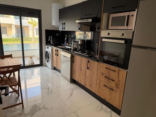 Superbe appartement 120 mc, Plage a pieds, 3 piscines & calme garanti - Sidi Rahal Plage in Sidi Rahal