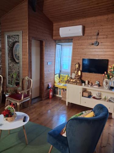Koplietošanas atpūtas telpa ar TV, Casa do Vale Encantado in Quinta da Pedra Escrita
