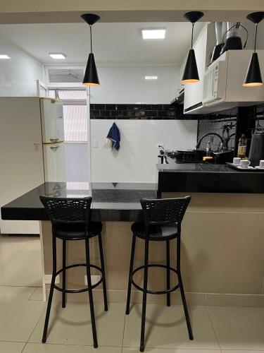 Kitchen, Praia Pitangueiras Guaruja Apto 74 Pe na Areia e Vista para o Mar near Rasa Manjari