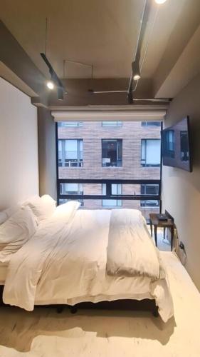 Loft Contemporáneo con Vista Exclusiva con WiFi Cerca del Parque 93