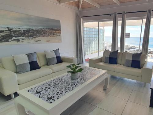 พอยต์ วิลเลจ โฮเทล แอนด์ เซลฟ์ แคทเทอริง (Point Village Hotel and Self Catering) in มอสเซล เบย์