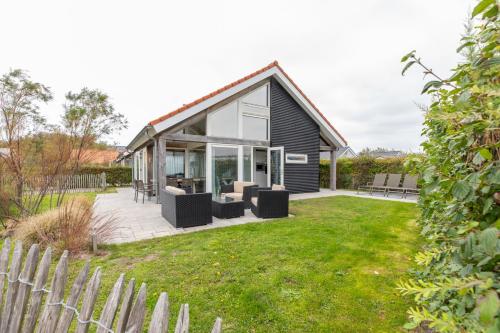 Zonnedorp 18 Duinhuis Renesse | Relaxte strandvakantie voor het hele gezin in เอาเดอ มอลเวก เอน ลาโอน