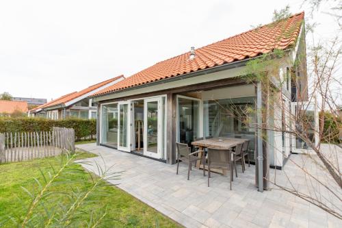 Zonnedorp 18 Duinhuis Renesse | Relaxte strandvakantie voor het hele gezin in เอาเดอ มอลเวก เอน ลาโอน