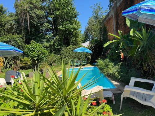 Tuchita House en Cataratas con piscina compartida, parrilla, cochera, wifi
