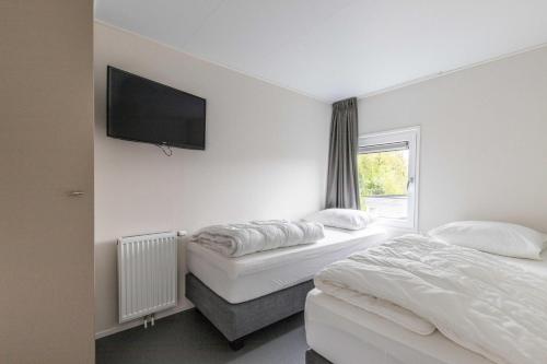 Zindering Renesse in โฮเคนบูมลาน