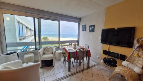 Le bleu des Vagues Ideal pour des vacances à 2 Face à la mer Wifi Parking privatif Clim - Location saisonnière - Saint-Cyprien